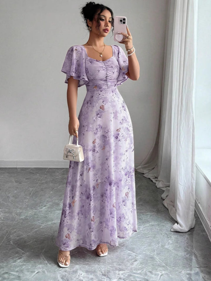 Women's maxi dress with flowing cut and romantic floral pattern Lune London