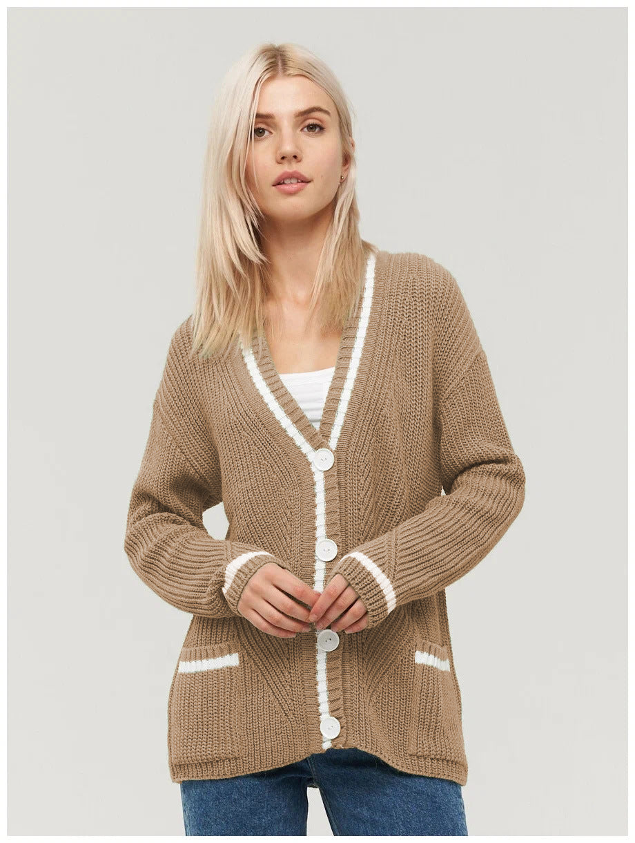 Ladies chunky knitted jacket with practical flap pockets and contrasting details Lune London
