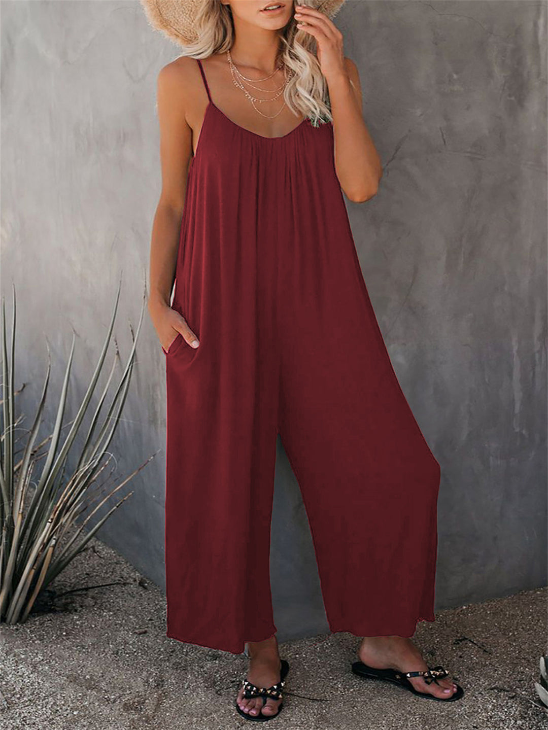 Casual summer jumpsuit for women with plunging neckline and practical pockets Lune London