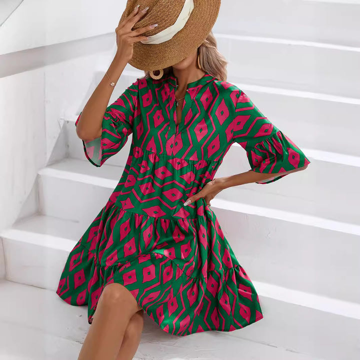 Shirt dress for women with voluminous ruffled sleeves and a playful floral pattern Lune London