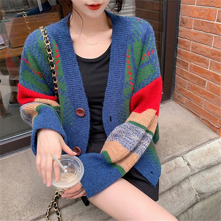 Ladies oversized knitted sweater with colorful checked pattern and large wooden buttons Lune London