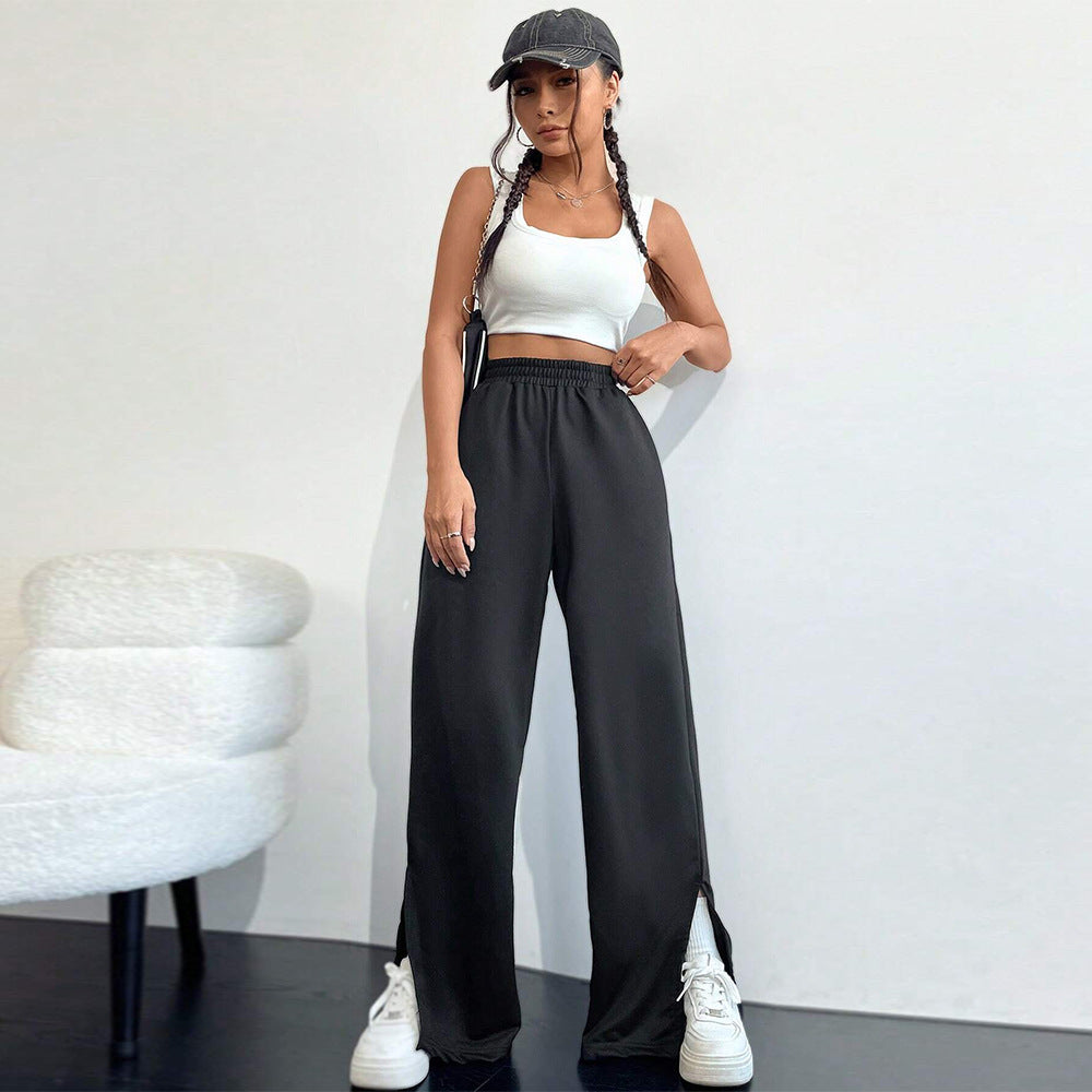 Pantalons satinés larges pour femmes avec taille élastique et fentes latérales Chic & Stil