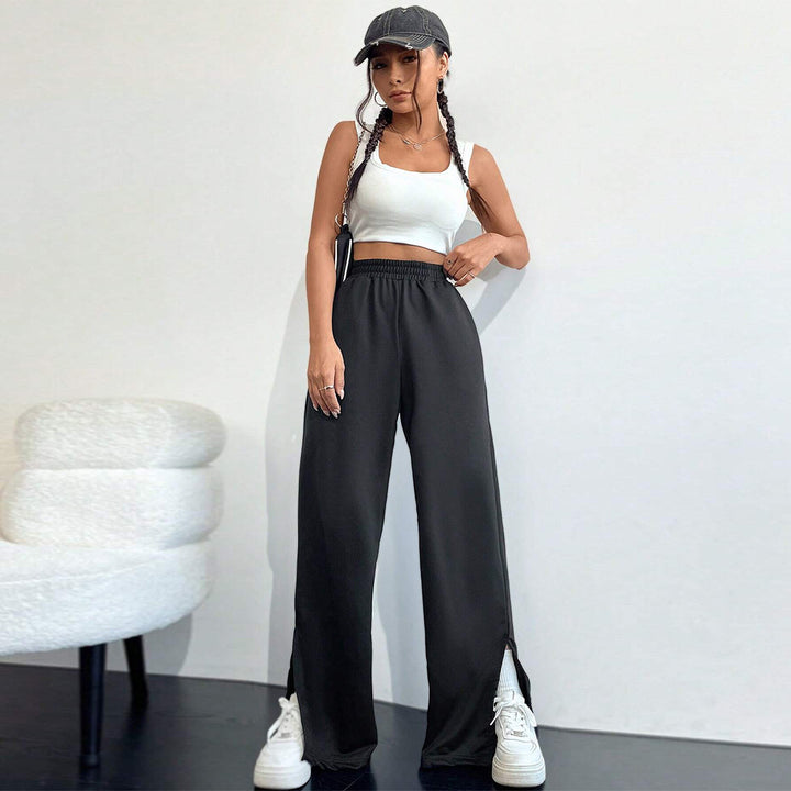 Pantalons satinés larges pour femmes avec taille élastique et fentes latérales Chic & Stil