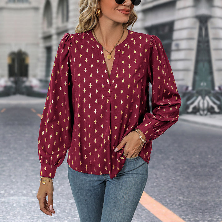 Ladies' blouse with elegant puff sleeves and decorative buttons Lune London