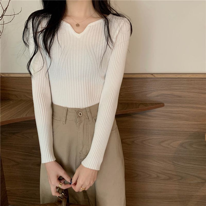Pull en maille fine pour femmes en V avec structure côtelée Chic & Stil