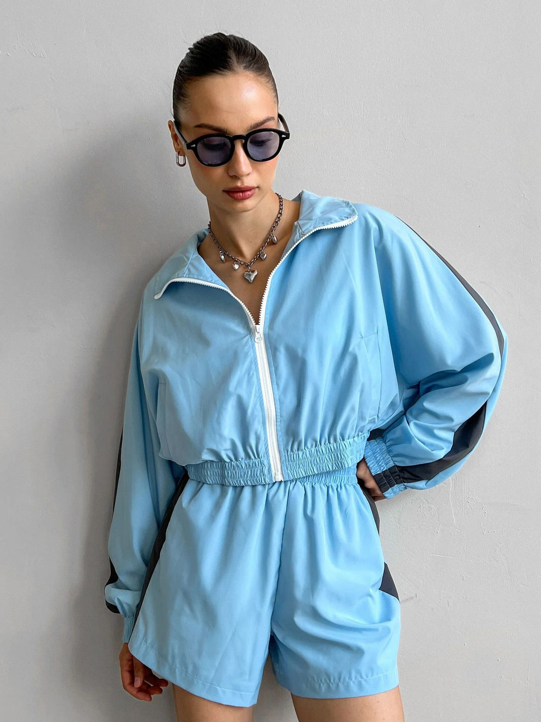 Ladies sporty jumpsuit with elastic belt and stylish cut Lune London