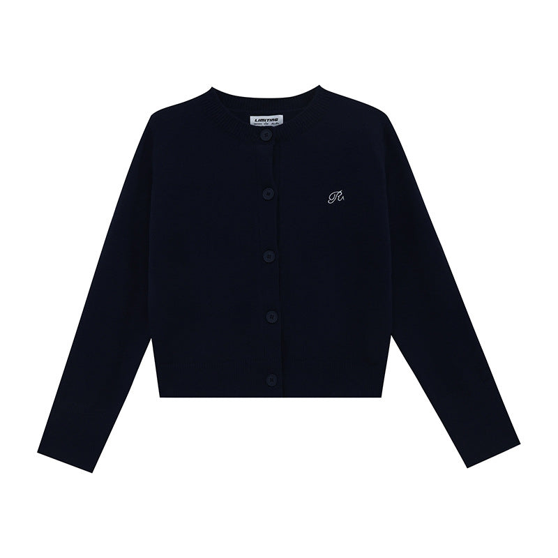 Women's knitted jacket with a fine ribbed pattern and contrasting button details Lune London