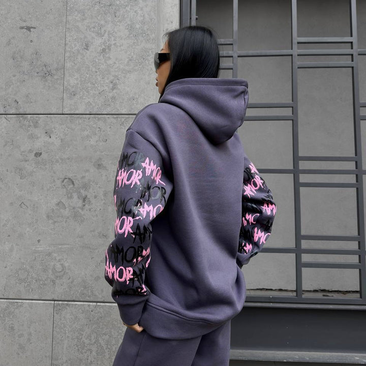 Hoodie for women with creative lettering and unique sleeve graphics Lune London