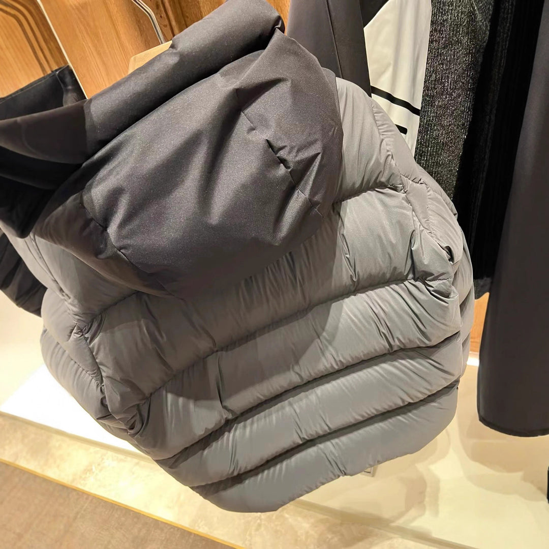 Ladies down jacket with high collar and practical zippered pockets Lune London
