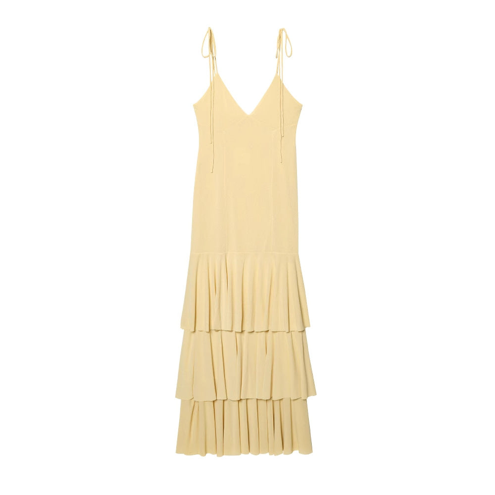 Maxi dress for women with voluminous ruffle details and adjustable spaghetti straps Lune London