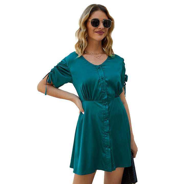 Summer dress with short sleeves for women with button detail and flounce hem Lune London