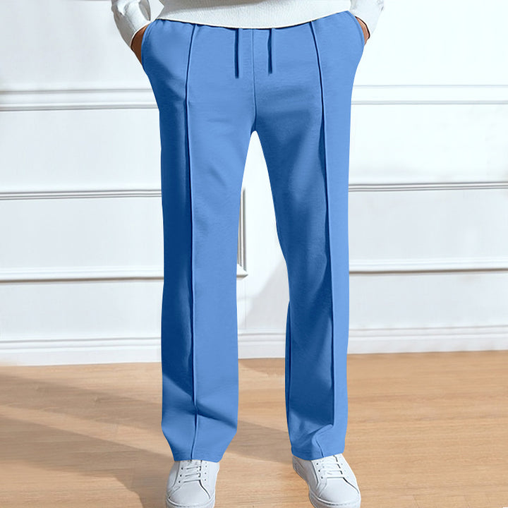 Men's leisure pants with elastic waistband and side snap buttons Lune London