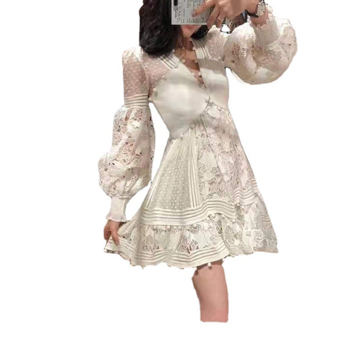 Women's playful floral dress with ruffle details and sheer puff sleeves Lune London