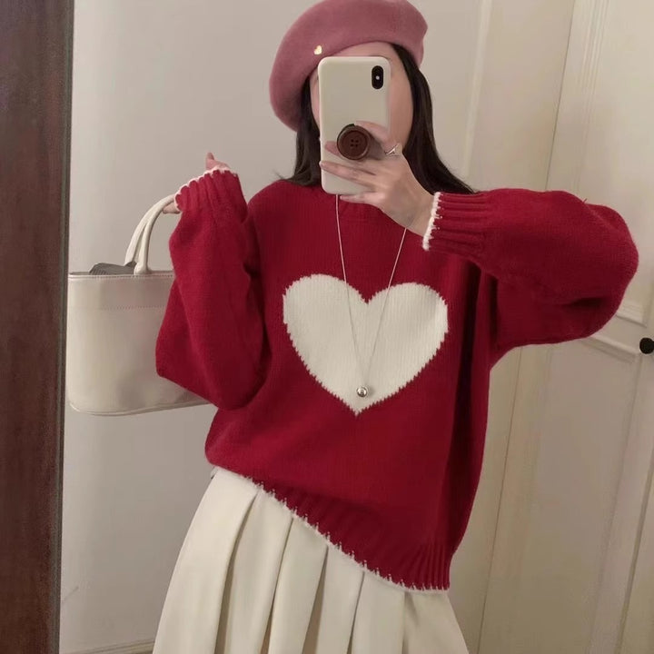 Trendy women's sweater with heart pattern and relaxed fit Lune London