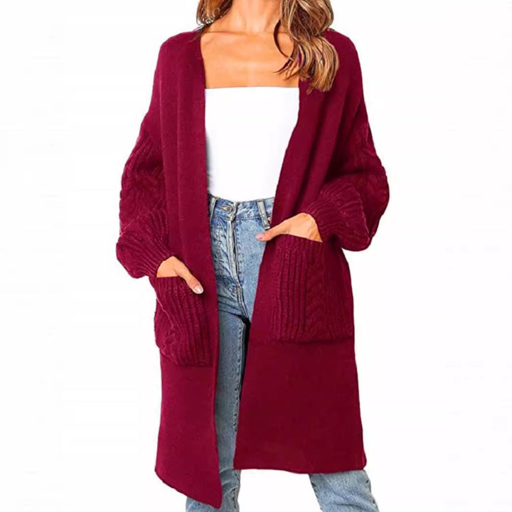 Knitted coat for women with deep V-neck and chunky knit details Lune London