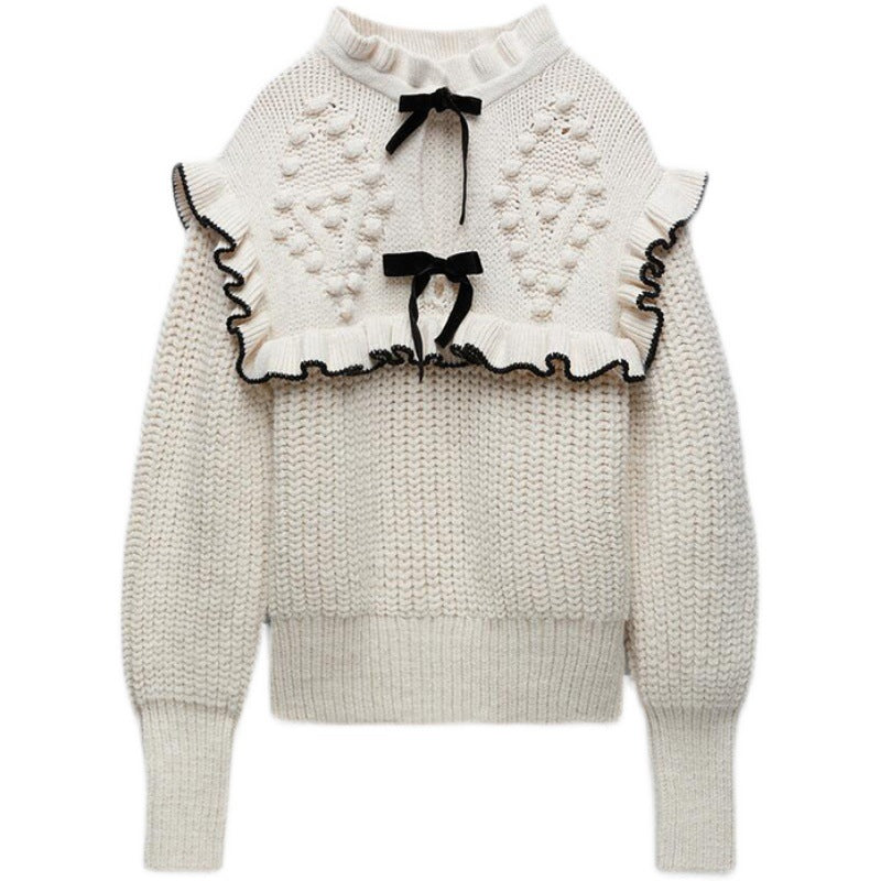 Knitted sweater for women with an elegant poultry and chic hood