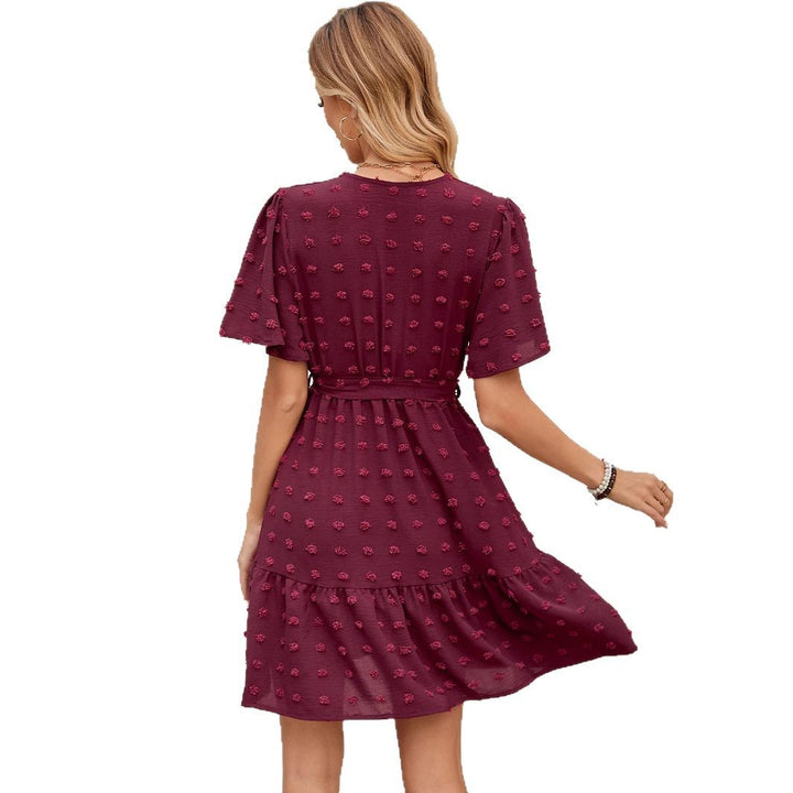 V neck wrap dress for women with a belt at the waist and textured fabric Lune London