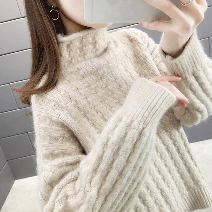 Knitted sweater for women with a modern ribbed design featuring a high collar and relaxed sleeves Lune London