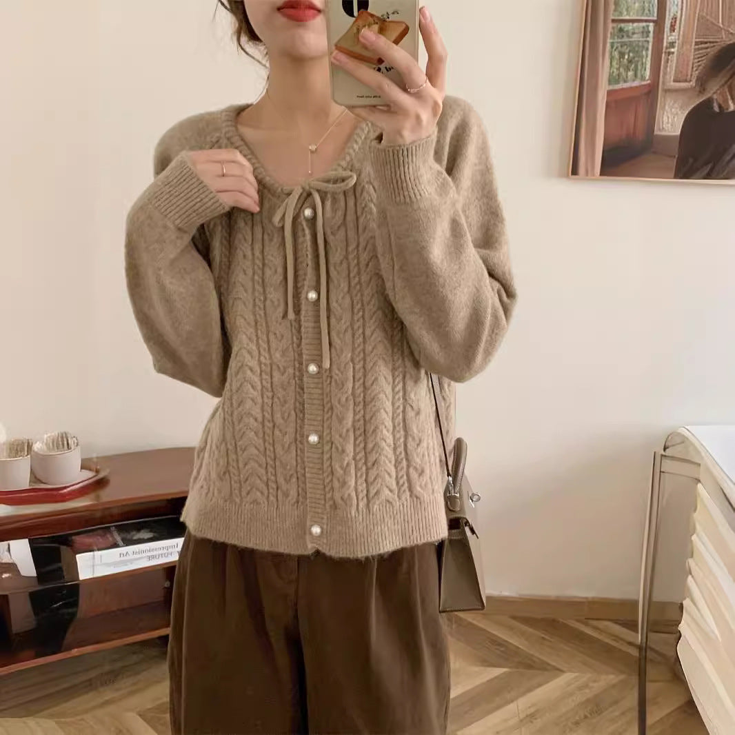 Chunky knit jacket for women with elegant pearl buttons and a structured design Lune London