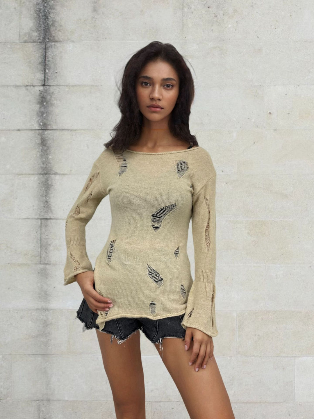 Pull en tricot pour femmes avec un design décontracté et effiloché Lune Londonl