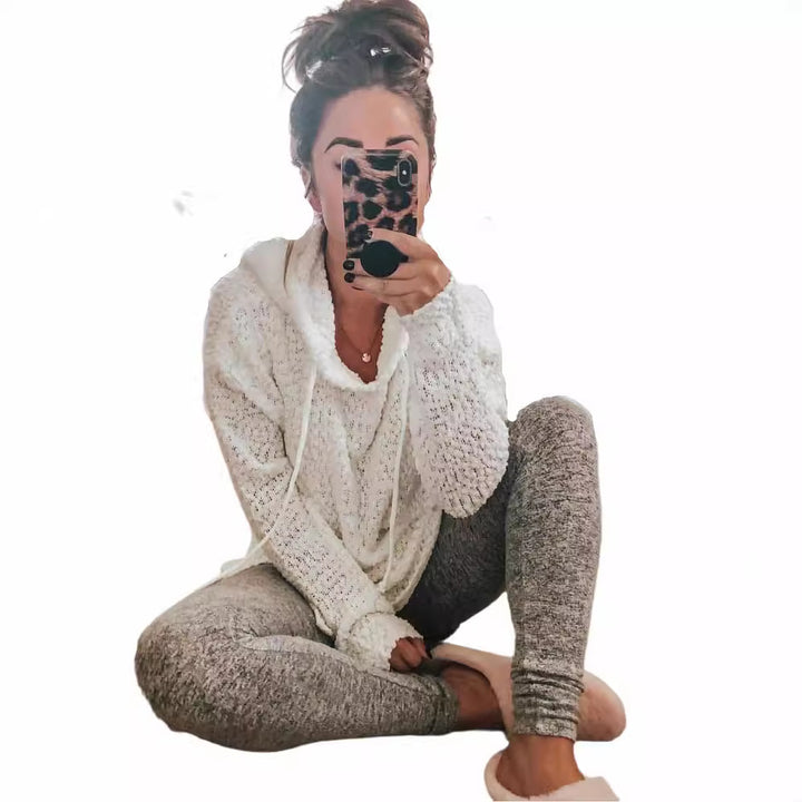 Pull en tricot décontracté pour femmes avec capuche et structure aérienne Chic & Stil