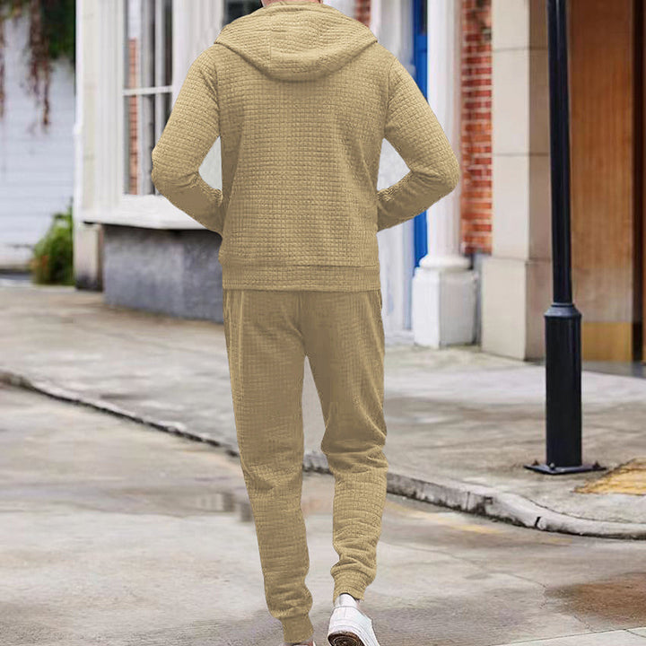 Urban tracksuit jacket for men with practical zippered pockets and structured surface Lune London