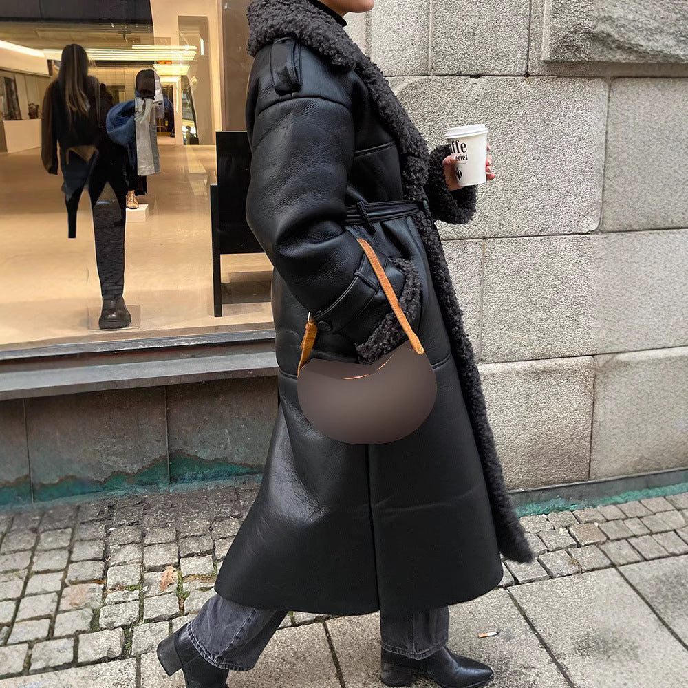 Oversized faux leather coat for women with textured inner lining Lune London
