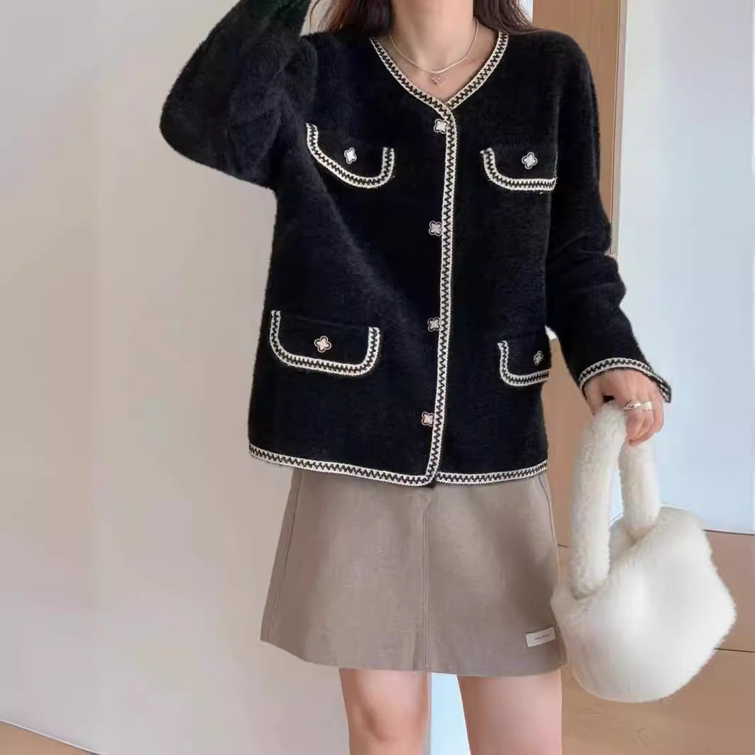 Ladies elegant knitted jacket with contrasting seams and pockets Lune London