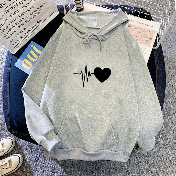 Women's hoodie with heartwarming design and cozy fit Chic & Stil
