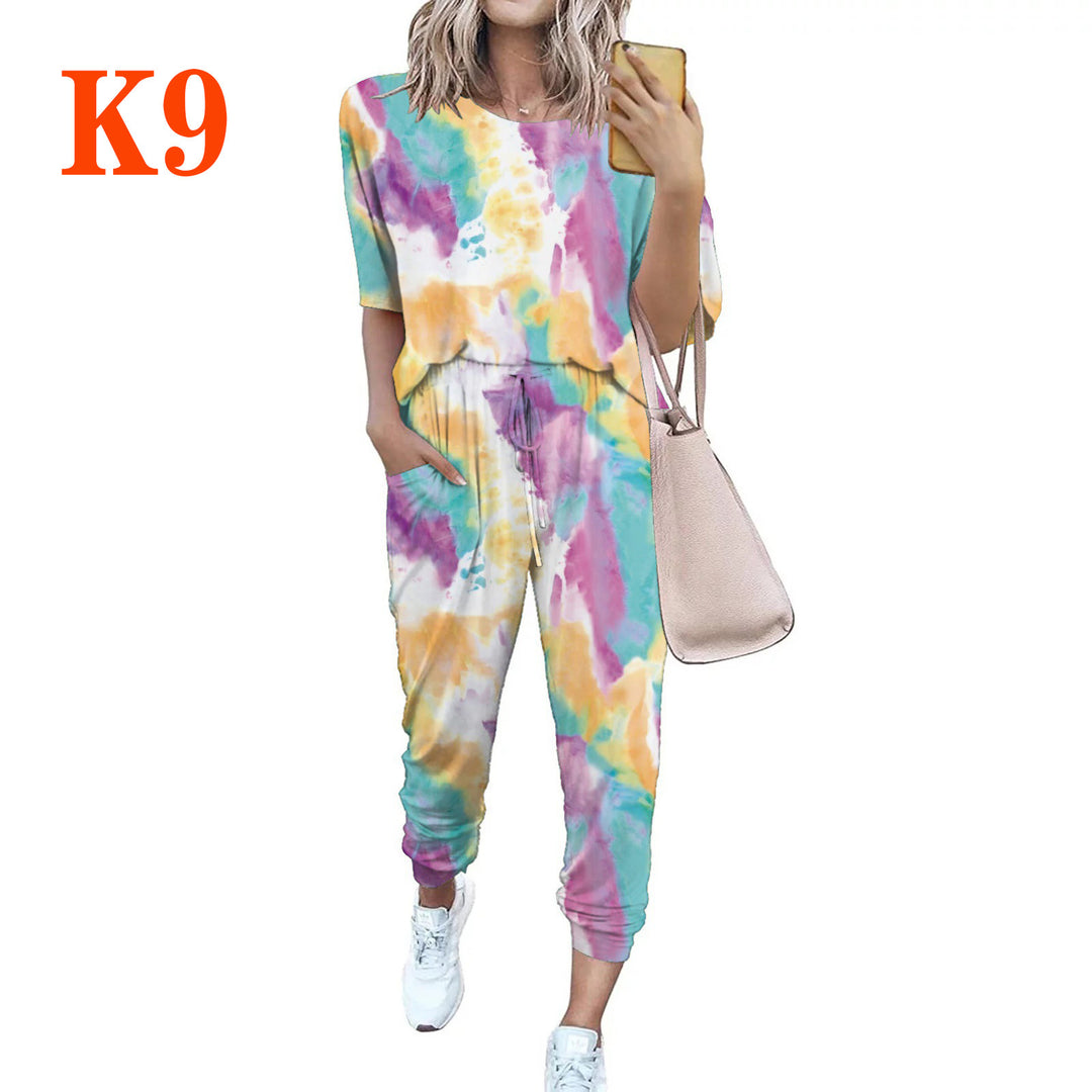 Ladies lightweight casual jumpsuit with a striking tie-dye pattern and practical pockets Lune London