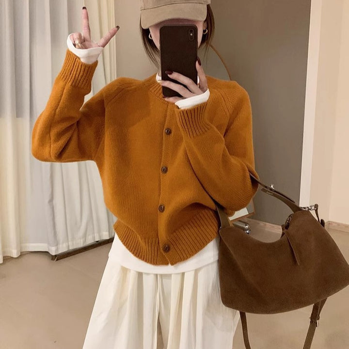 Comfortable knit sweater for women with button details and dropped shoulders Lune London