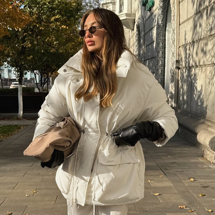 Quilted winter jacket for women with high collar and practical drawstring waist Lune London