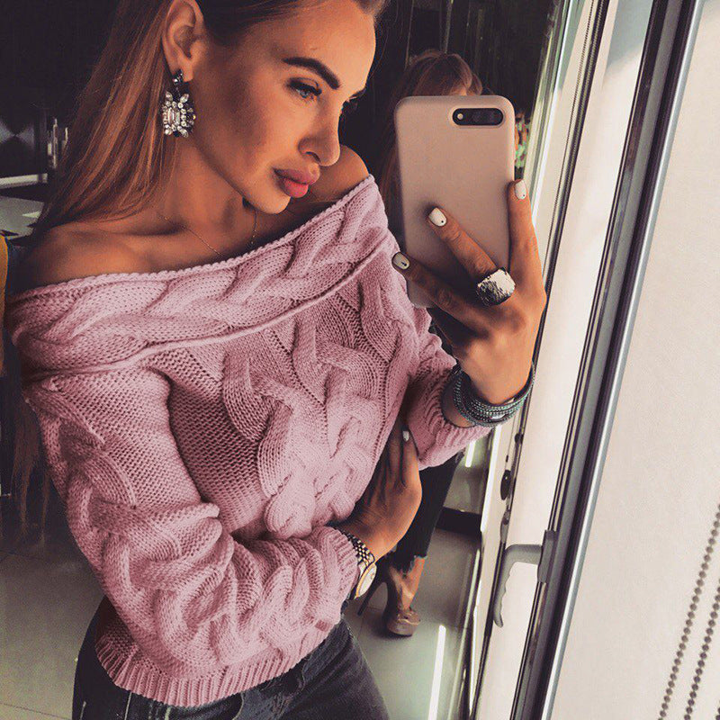 Women's knit sweater with modern cable pattern and chic décolleté silhouette