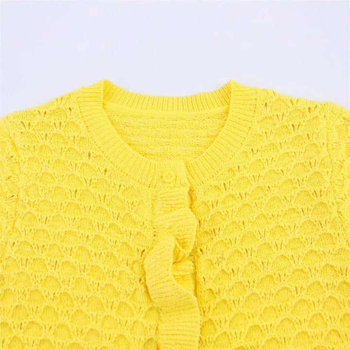 Knitted jacket for women with ruffle details and buttonhole Lune London