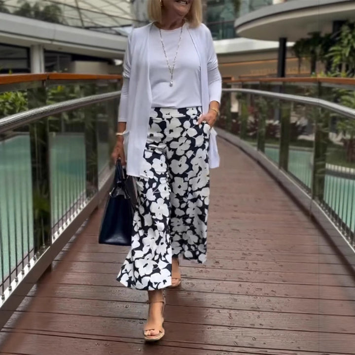 Pantalons d'été larges pour femmes avec motif floral et taille élastique Chic & Stil