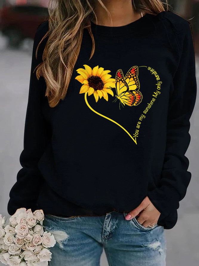 Sweatshirt pour femmes avec motif graphique de papillon et de tournesol Chic & Stil