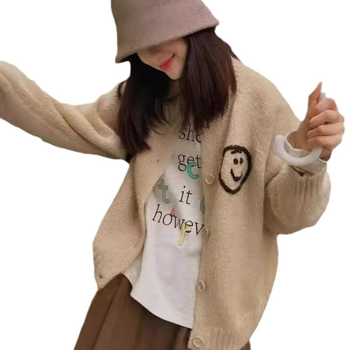 Women's cardigan and comfortable knit with playful Smiley pattern Lune London