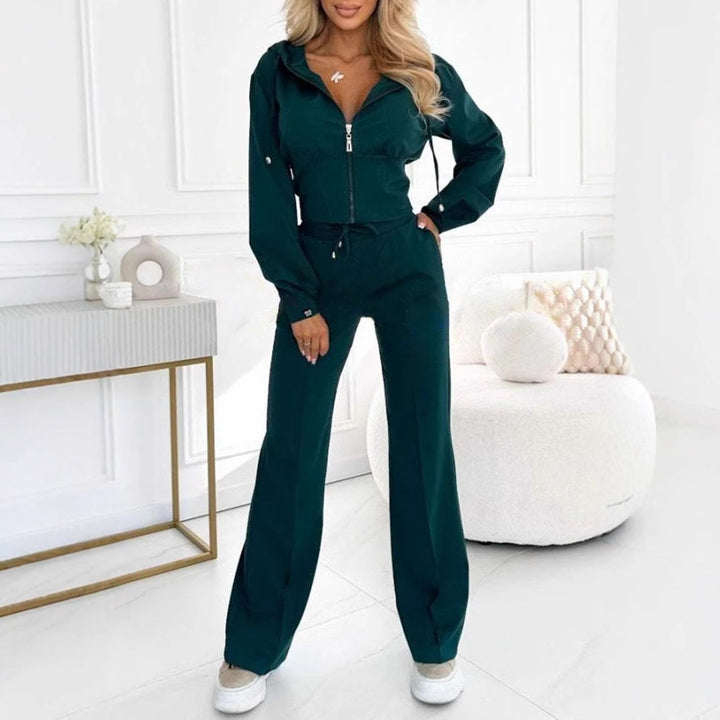 Women's sports jumpsuit set with high collar and practical pockets Lune London