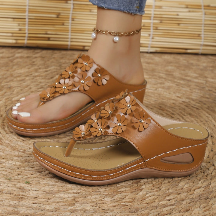 Elegant flip-flop sandals for women with floral appliqués Lune London