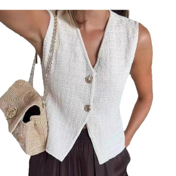 Ladies sleeveless cardigan with decorative buttons and beautiful texture Lune London