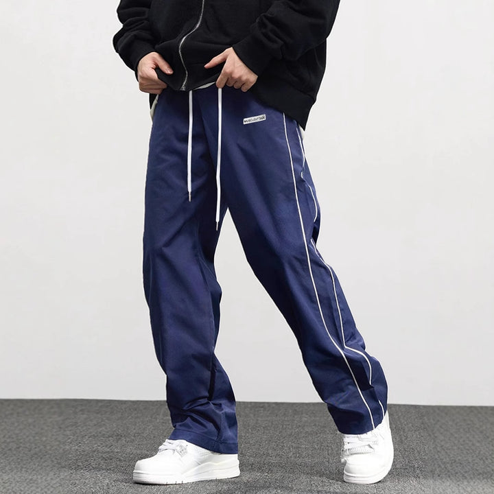 Casual men's jogger pants with elastic waist and contrasting side stripes Lune London