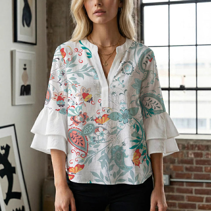Ladies elegant top with voluminous ruffle hems and floral design Lune London