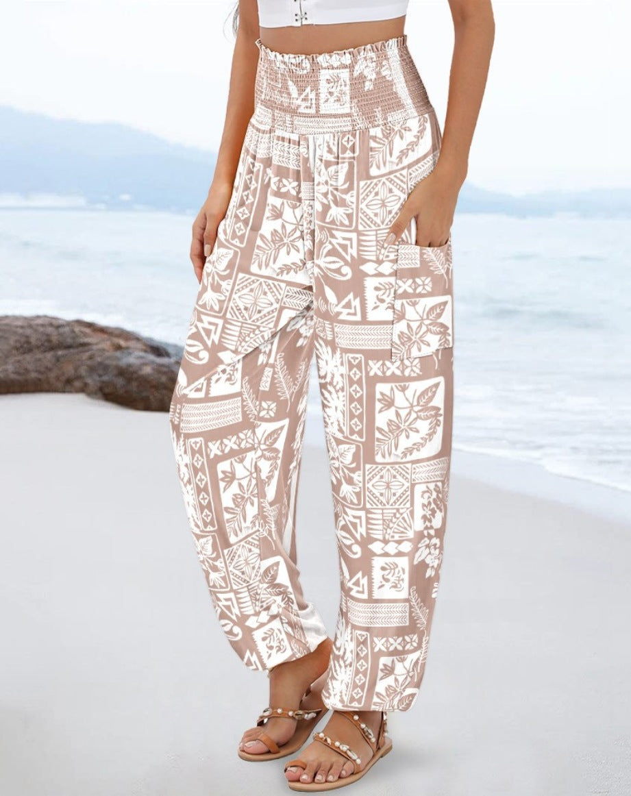 Wide Palazzo pants for women with colorful Paisley pattern and elastic waistband Lune London
