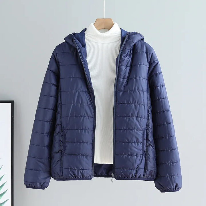 Ladies quilted transitional jacket with practical pockets and hood Lune London