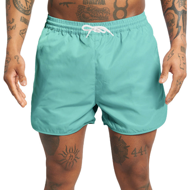 Shorts de bain pour hommes avec taille élastique et poches latérales pratiques Lune London
