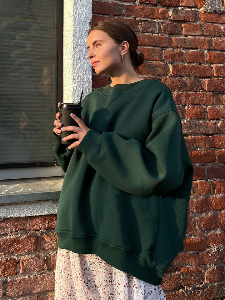 Woman Oversized sweatshirt with a relaxed fit and modern chic accents and style