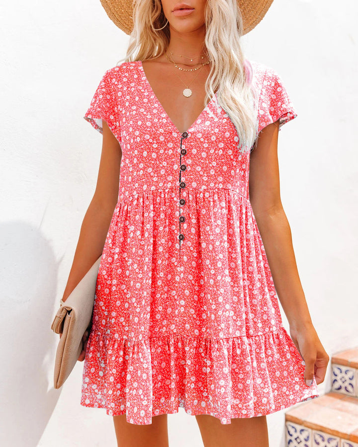 Summer dress for women with floral patterns and button details Lune London