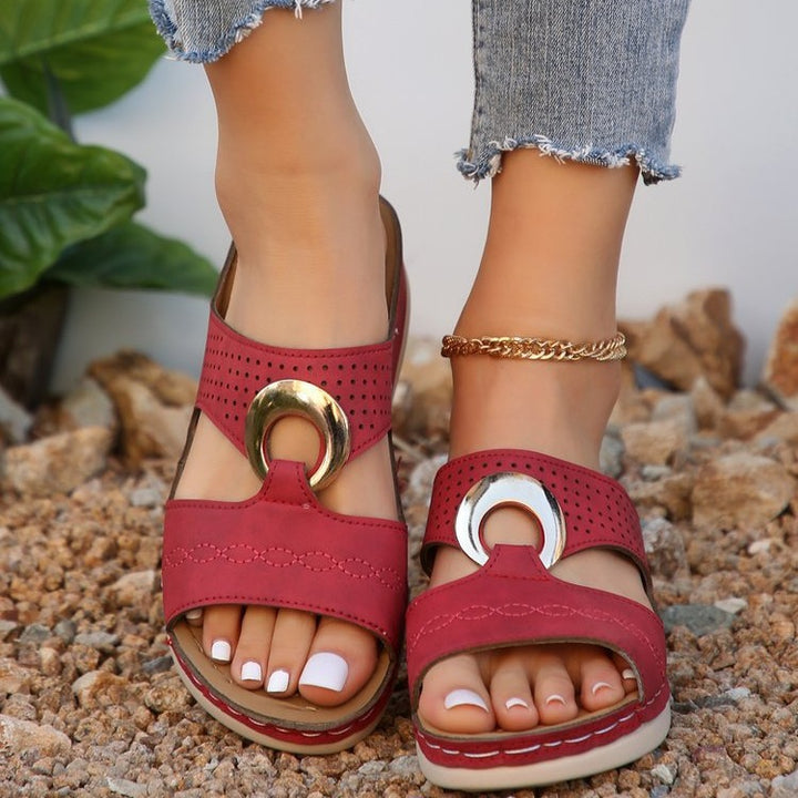 Women Sabot with perforations and decorative buckle Lune London
