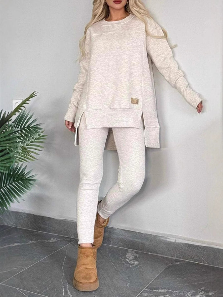 Ladies Casual Long Sleeve Asymmetrical Cut Sweatshirt with Practical Pockets Lune London