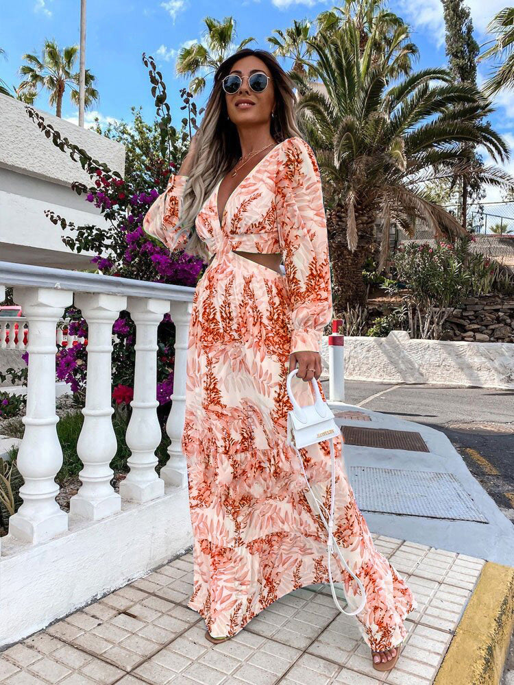 Maxi dress for women with an elegant V-neckline and a playful ruffled hem Lune London